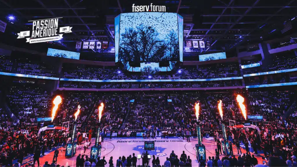 Milwaukee Bucks NBA au Fiserv Forum, ambiance intense avec supporters et animations pyrotechniques